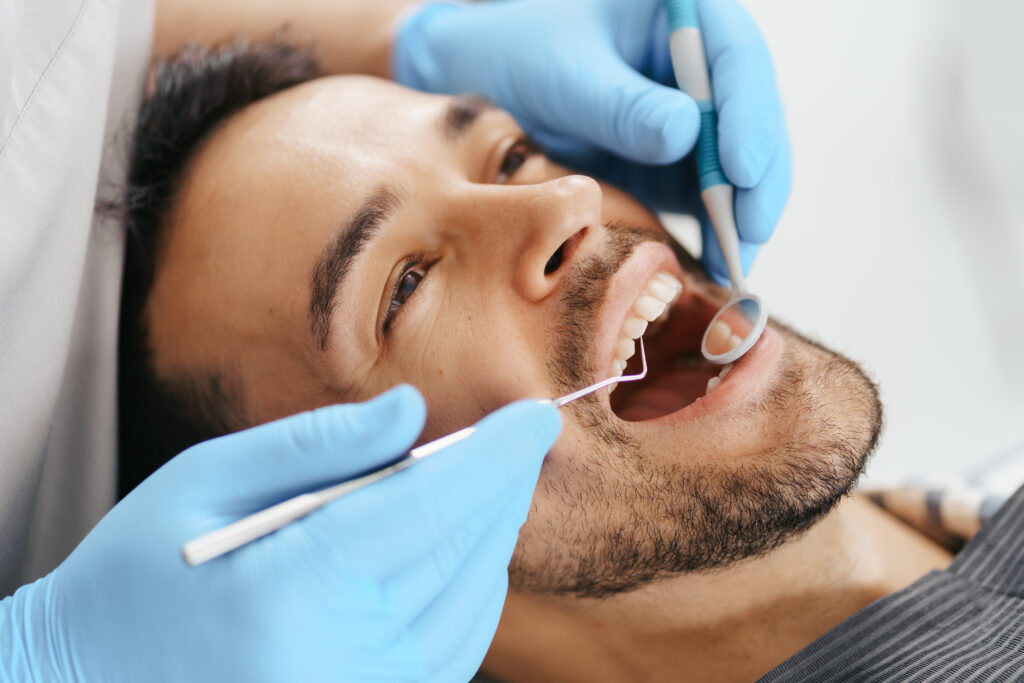 patient male at dentist
